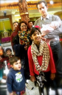 Waiting in line, photography prohibited sign cropped out.